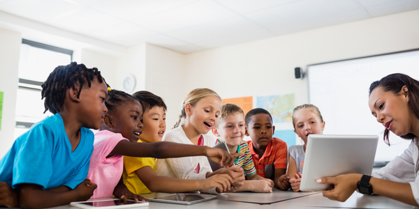 Group of Kids Studying Through Laptop.